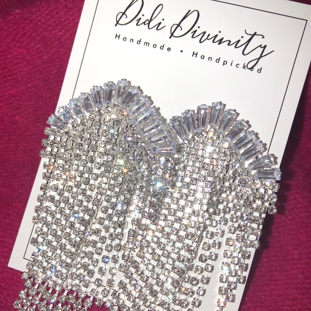 These beautiful Crystal Chandeliers (sold)